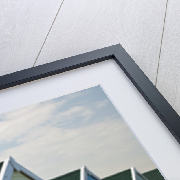 Beach huts in a row, close-up by Assaf Frank